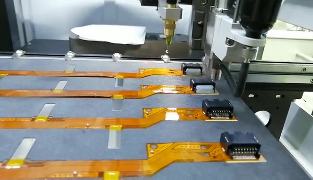 自動點膠機.jpg 自動點膠機.jpg